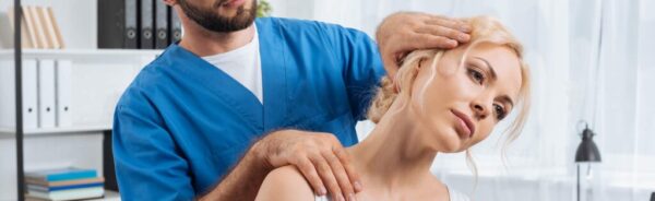 portrait-of-chiropractor-stretching-neck-of-woman-2024-11-01-03-36-52-UPDD2ZQ-1024x683