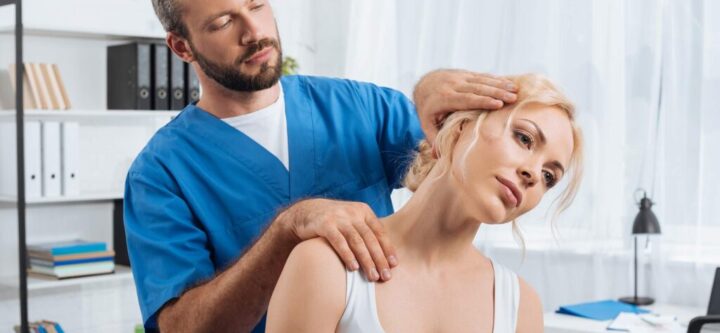 portrait-of-chiropractor-stretching-neck-of-woman-2024-11-01-03-36-52-UPDD2ZQ-1024x683
